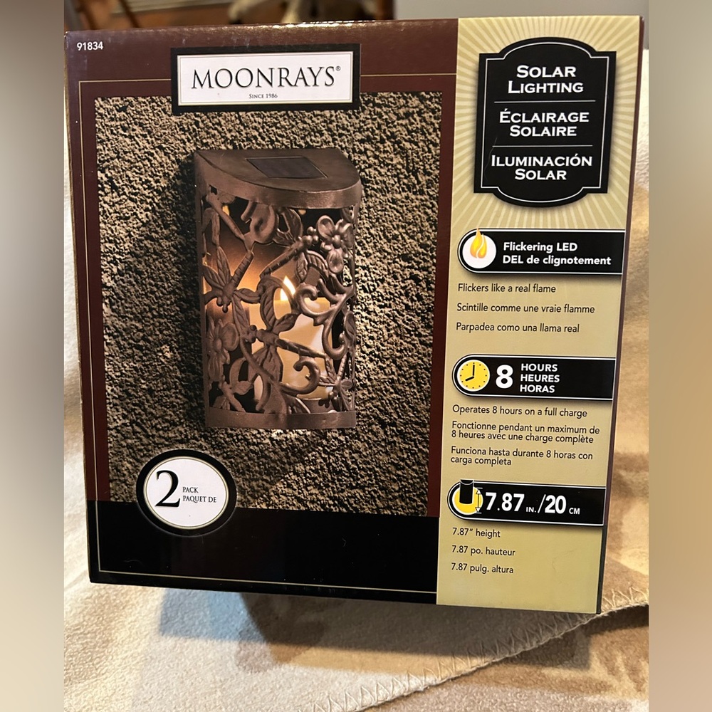 NWOT two pack solar lights. Brown metal. Still in box.
